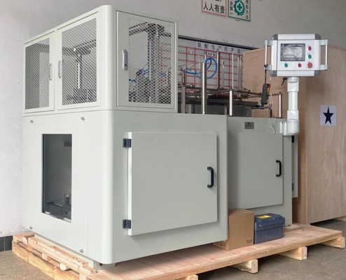 機械に機械を形作るファースト・フードのカートンをする紙箱のヒート シール